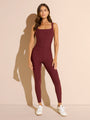 front of burgundy swim tankini top with tummy control paired with leggings
