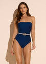 Model wearing Dreamsculpt strapless navy tummy-control bandeau swimsuit with belt on neutral backdrop 