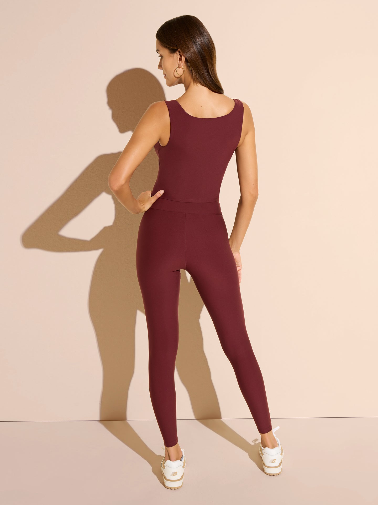 burgundy swim tankini top with tummy control paired with leggings